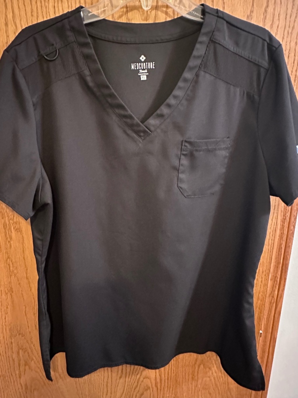 Women’s black scrub top
